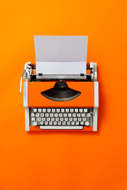 istock 70s Typewriter with a blank Sheet of Paper 1355295762
