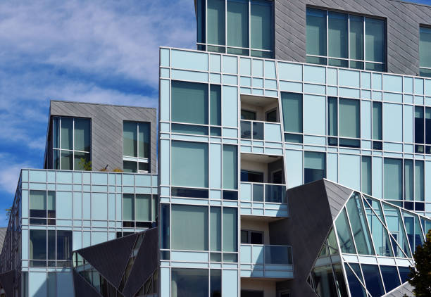 Tall apartment building with balconies along the whole facade.