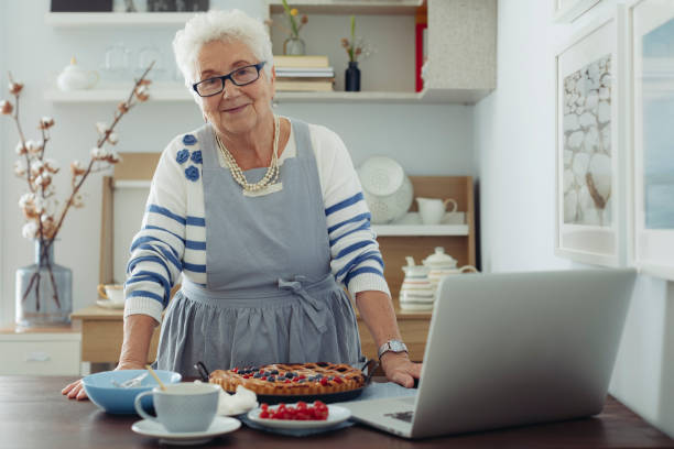 istock Senior woman at home 1355300089
