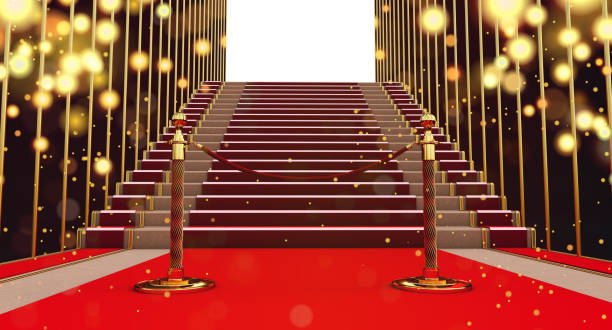 istock long red carpet between rope barriers with stair at the end, 1355301668