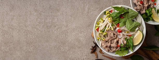 Delicious vietnamese beef noodles pho with ingredients.