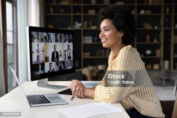 Happy African American Employee Talking On Video Conference Call Stock Photo - Download Image Now