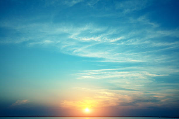 istock Colorful cloudy sky at sunset. Sunset over the sea. Sky texture. Abstract nature background 1355304597