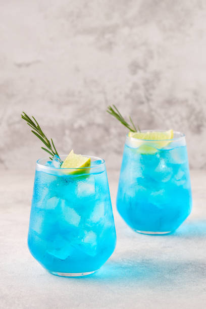 istock Refreshing blue drink or cocktail with ice 1355312940