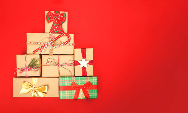 istock Gifts in the shape of a Christmas tree 1355313199