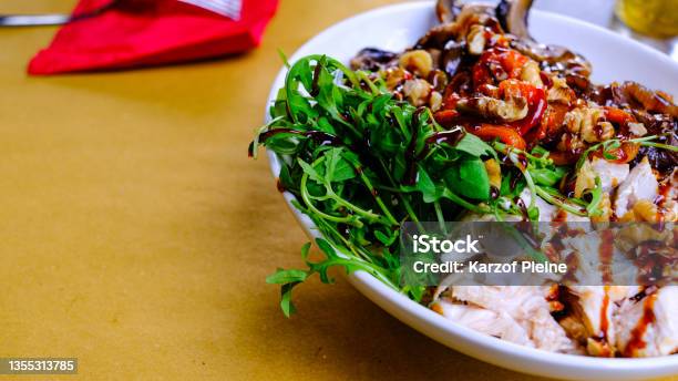 Detail Of Poké Plate Rice Chicken Arugula Walnuts Stock Photo - Download Image Now
