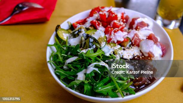 Detail Of Poké Plate Rice Tuna Rocket Vegetables Stock Photo - Download Image Now