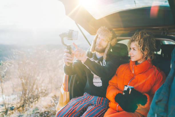 istock Couple on hiking is vlogging 1355313843