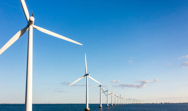 istock Windmills of shore 1355317979