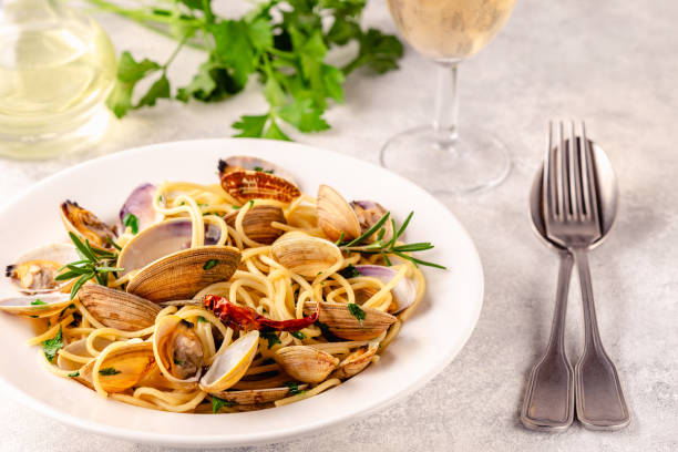 istock Seafood pasta with clams Spaghetti alle Vongole on a light background 1355318047