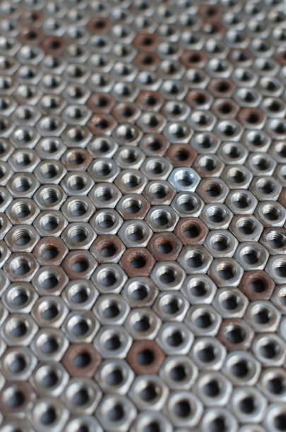 istock Background of metal mounting nuts. 1355320267