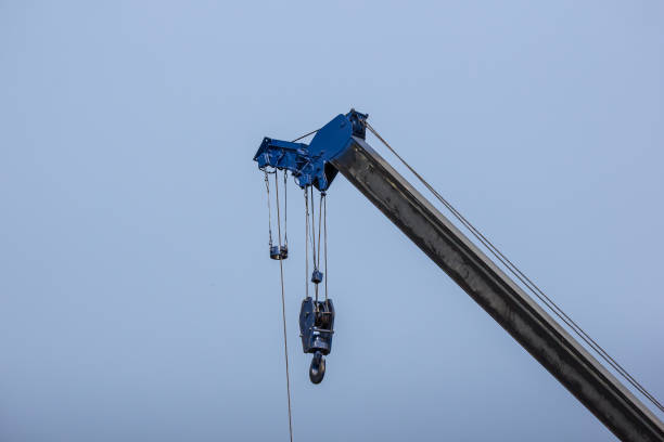 istock Truck crane boom with hooks 1355321018