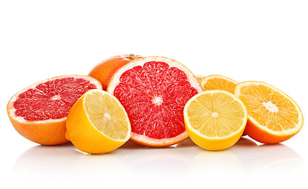 istock fresh fruits orange lemon grapefruit in cut 135532570