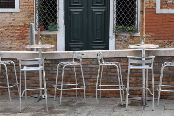 istock Street cafe with empty tables outdoor 1355325905