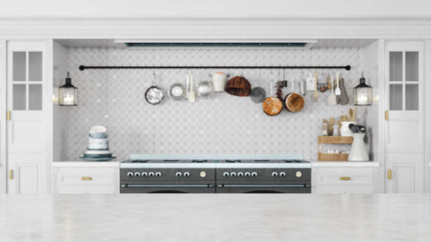 Empty White Marble Kitchen Countertop In Modern Kitchen Empty white marble kitchen countertop with copyspace. Focus on foreground. kitchen island stock pictures, royalty-free photos & images