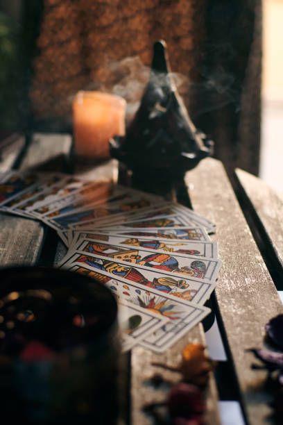 istock Tarot cards on a wooden table 1355328162