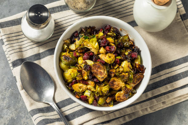 Homemade Thanksgiving Cranberry Brussel Sprouts Homemade Thanksgiving Cranberry Brussel Sprouts with Balsamic Dressing brussels sprout stock pictures, royalty-free photos & images