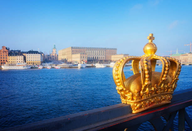 istock Royal crown and Stockholm cityscape 1355329382
