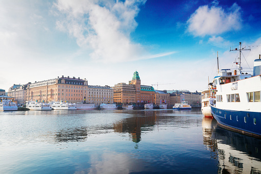 Scenic waterfrontand embankment panorama of the Old Town in Stockholm, Sweden, toned