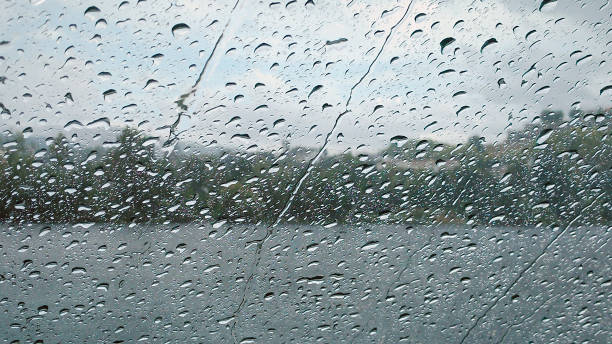 Landscape through the window in a rainy day. stock photo