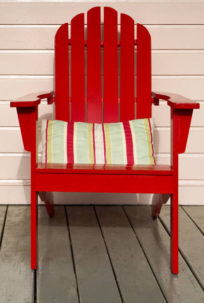 istock Bright red Adirondack chair 1355332234