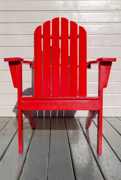 istock Bright red Adirondack chair 1355332239