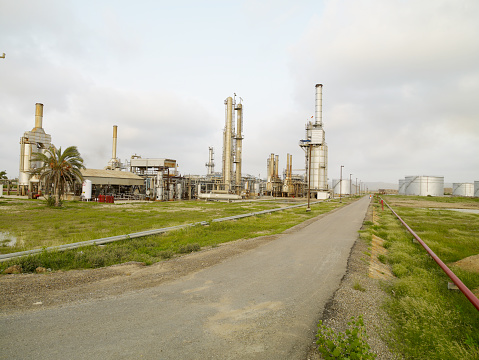 Petrochemical industry refinery on sunset night view. motion and blurred