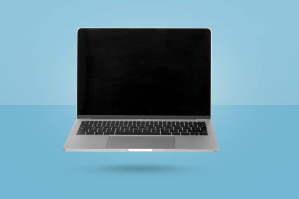 istock Creative minimal background  with Laptop  computer with empty screen levitating in the air on a blue background. 1355333561