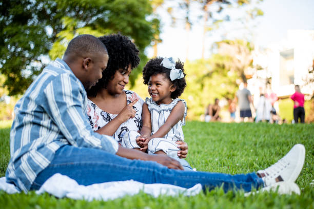 istock Black family spending an afternoon in the park 1355338406