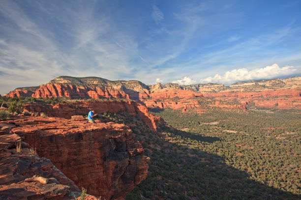 istock Man Praying In Beautiful Arizona Desert Scene 1355338617