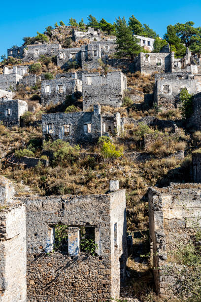 istock Abandoned Kayakoy (Levissi Village, Karmylassos) stone houses 1355339624