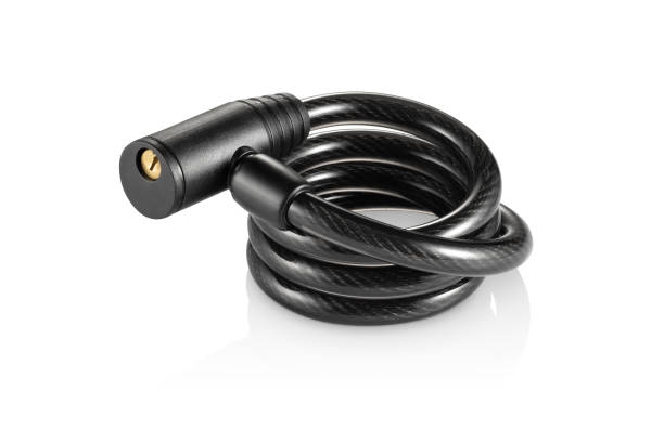 istock Black rolled up steel lock for bikes , isolated 1355342150