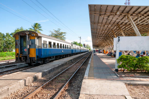 istock Train At A Station Platform In Thailand 1355343294