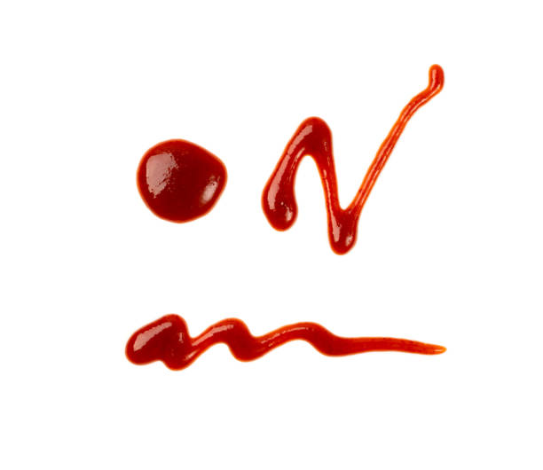 ketchup smile isolated on white background. face of tomato sauce