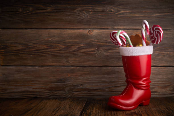 istock Santa boots with sweets and gifts for St. Nicholas Day on December 6th. 1355344505