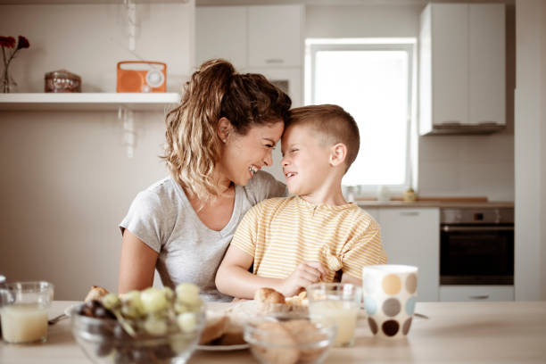 istock Mother and Her Son Having Breakfast 1355345292