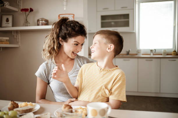 istock Mother and Her Son Having Breakfast 1355345293