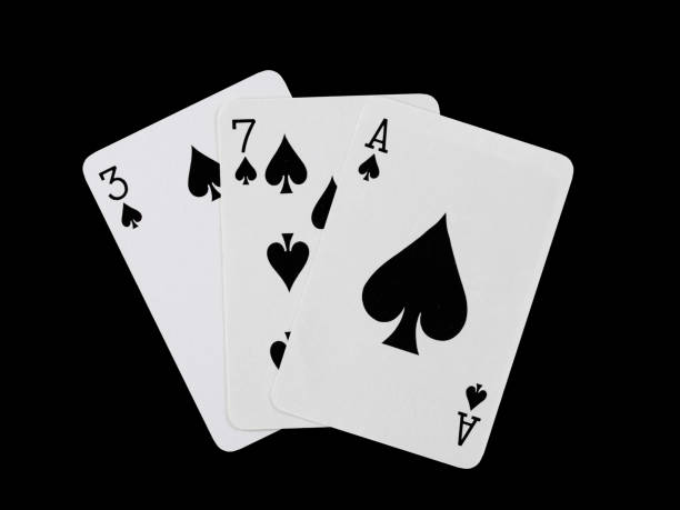 playing cards 3, 7 and ace are fanned out, isolated on a black background - poker cards royal flush heart shape imagens e fotografias de stock