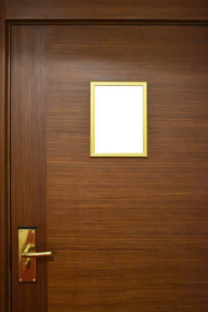 istock Information board, placard frame (Clipping Path) on the room door 1355347276