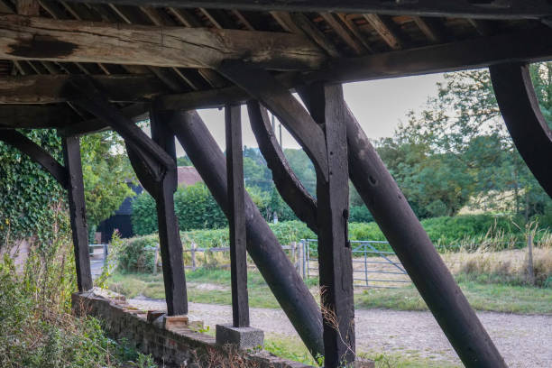 istock Old timber framed building on a farm 1355349215