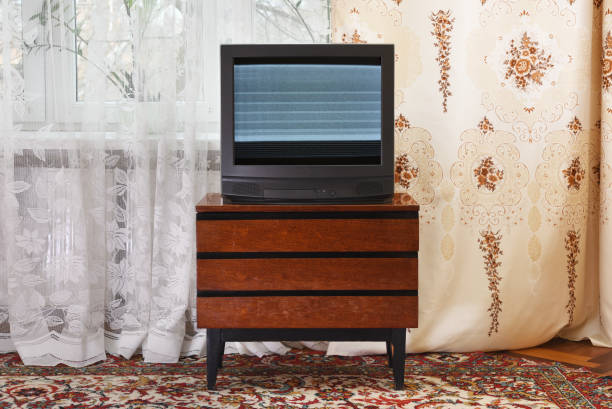 Old TV with clutter on screen, vintage design in 80s and 90s style.