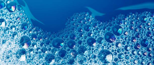 Soap suds background (blue) stock photo