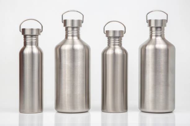 istock metal steel water flasks on white background. metal drinking utensils 1355365082