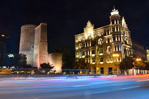 Maiden Tower and historical building in the night city of Baku