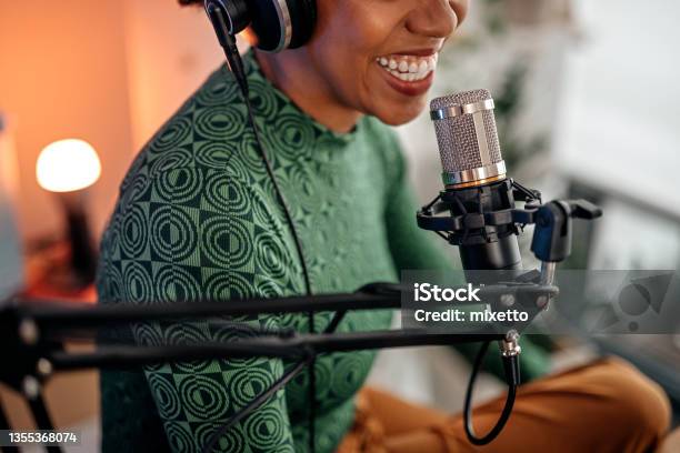Smiling Young Woman Recording Podcast Stock Photo - Download Image Now - Podcasting, The Media, Radio