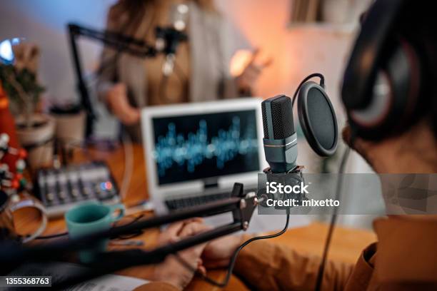 Young People Recording Podcast In Studio Stock Photo - Download Image Now - Podcasting, Microphone, Radio