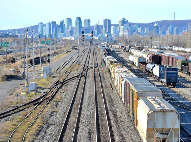 Chicago, Illinois skyline at dusk with freight train