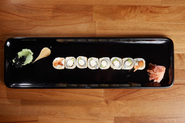 istock Various sushi on porcelain plate on table 1355370202