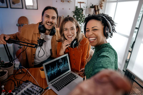 People taking picture after podcast recording