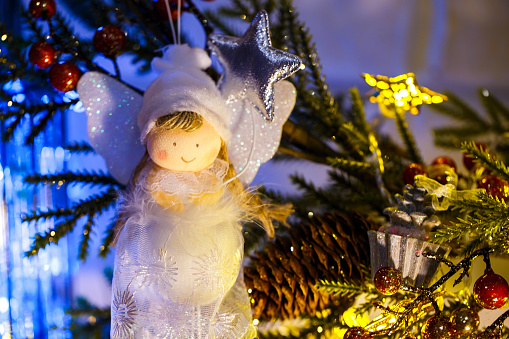 Closeup image of Christmas Ornaments on a beautifully decorated tree